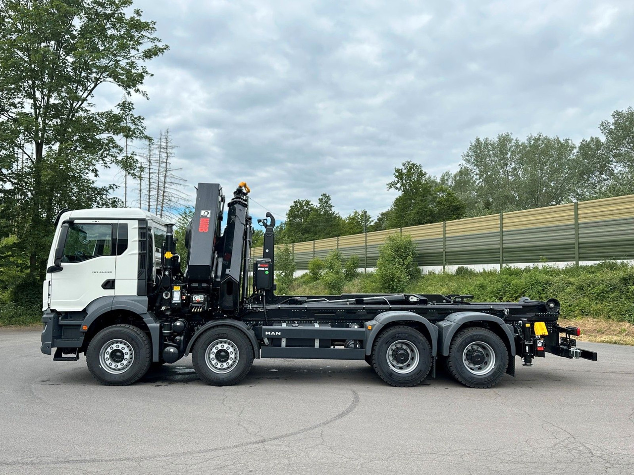 MAN TGS 35.520 8x4 Abrollkipper + Kran HIAB 658E6 - Camión multibasculante, Camión grúa: foto 4 MAN TGS 35.520 8x4 Abrollkipper + Kran HIAB 658E6 - Camión multibasculante, Camión grúa: foto 4