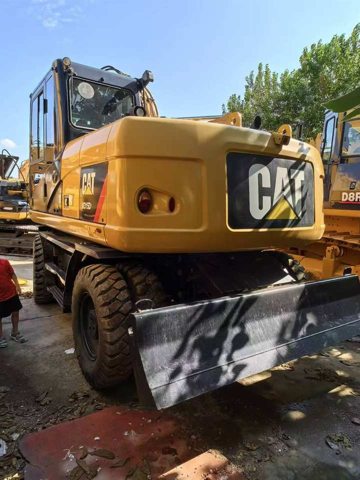 Used Caterpillar M315D2 Mini Wheel Excavator With Core Components for Diggers and Excavators - Excavadora de ruedas: foto 5 Used Caterpillar M315D2 Mini Wheel Excavator With Core Components for Diggers and Excavators - Excavadora de ruedas: foto 5
