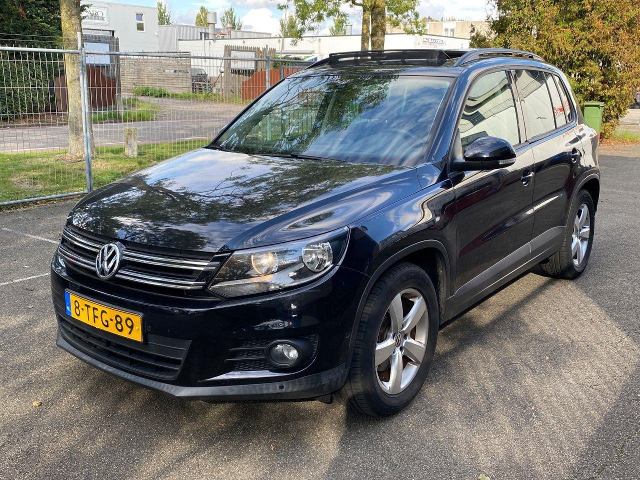 Volkswagen Tiguan 1.4 TSI Comfort&Design Edition | 2014 | 82.628 km | 8TFG89 | NAP: Logisch - SUV/ Todoterreno: foto 1 Volkswagen Tiguan 1.4 TSI Comfort&Design Edition | 2014 | 82.628 km | 8TFG89 | NAP: Logisch - SUV/ Todoterreno: foto 1