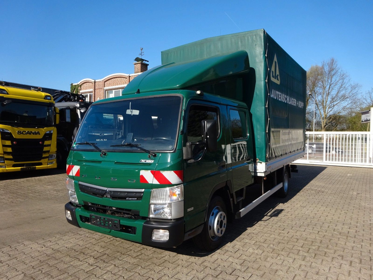 FUSO 7C180D Canter mit Doppelkabine 4x2 - Furgoneta con lona, Furgoneta combi: foto 1 FUSO 7C180D Canter mit Doppelkabine 4x2 - Furgoneta con lona, Furgoneta combi: foto 1