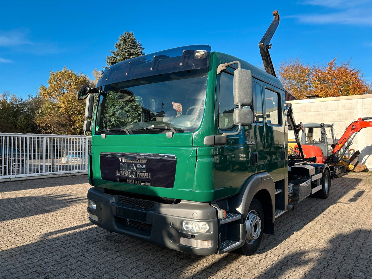 MAN 12.250 Doppelkabine Abroller - Camión multibasculante: foto 1 MAN 12.250 Doppelkabine Abroller - Camión multibasculante: foto 1