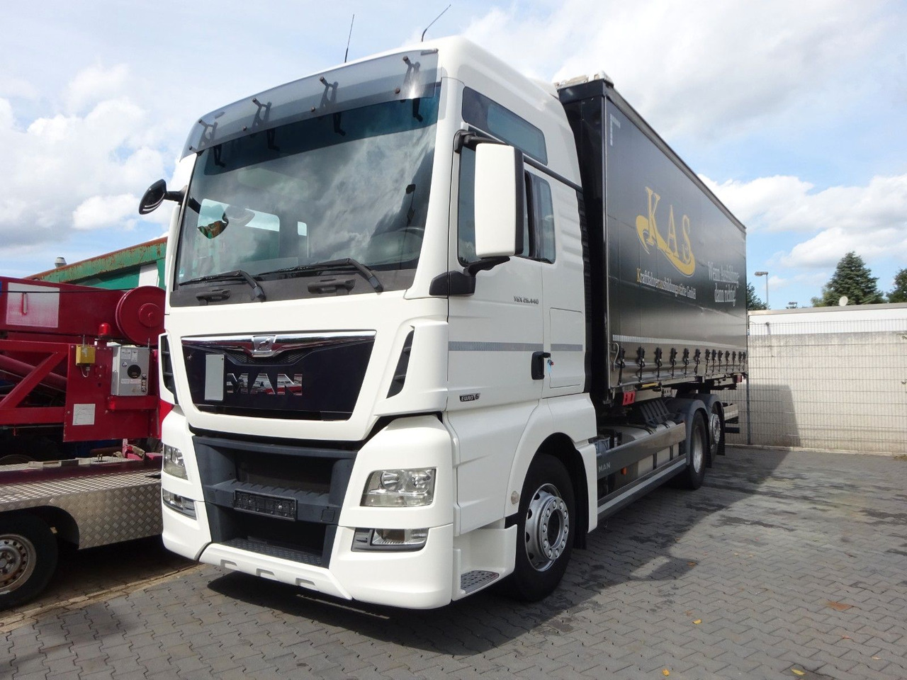 MAN 26.440 TGX BDF Wechselsystem 6x2 - Camión portacontenedore/ Intercambiable: foto 1 MAN 26.440 TGX BDF Wechselsystem 6x2 - Camión portacontenedore/ Intercambiable: foto 1
