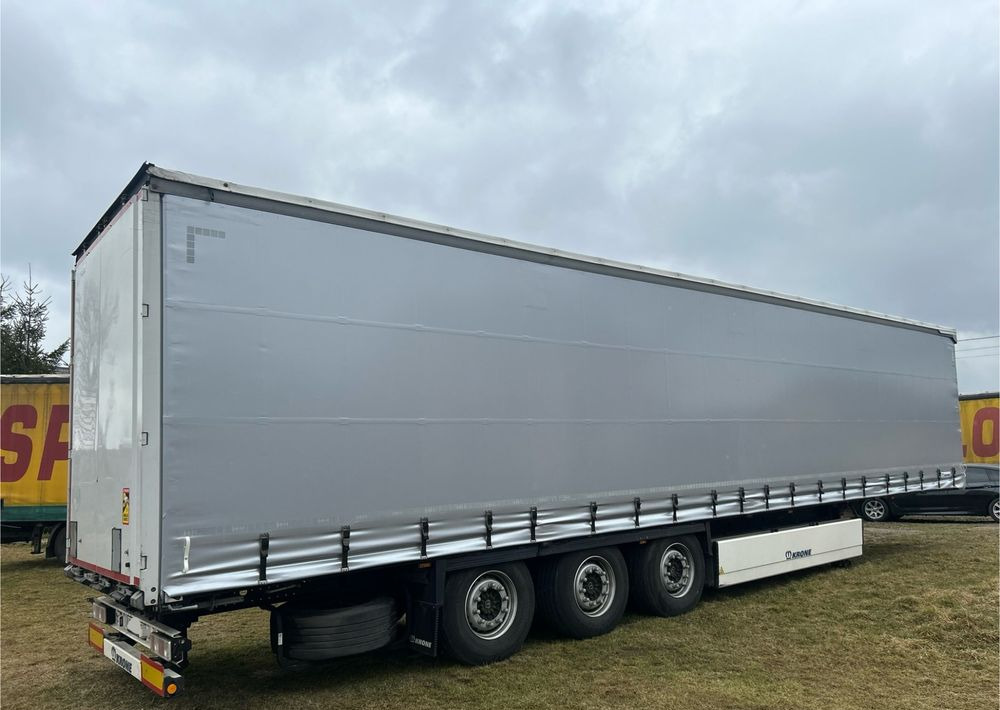 Krone STANDARD 2021 podnoszona oś OPONY 70% / STAN BARDZO DOBRY / OD PIERWSZEGO WŁAŚCICIELA / PALECIARA / TOP / sprowadzona z Niemiec !! - Semirremolque lona: foto 2 Krone STANDARD 2021 podnoszona oś OPONY 70% / STAN BARDZO DOBRY / OD PIERWSZEGO WŁAŚCICIELA / PALECIARA / TOP / sprowadzona z Niemiec !! - Semirremolque lona: foto 2