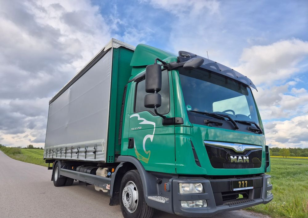MAN TGL 12.250 6.2m AUTOMAT KLIMA z Niemiec ESP nowe opony EURO 6 / 4.75 rozstaw / zawiesie na wózek widłowy / TOP STAN / okazja nauka jazdy MOŻLIWOŚĆ DOSTOSOWANIA 12t - Camión lona: foto 1 MAN TGL 12.250 6.2m AUTOMAT KLIMA z Niemiec ESP nowe opony EURO 6 / 4.75 rozstaw / zawiesie na wózek widłowy / TOP STAN / okazja nauka jazdy MOŻLIWOŚĆ DOSTOSOWANIA 12t - Camión lona: foto 1