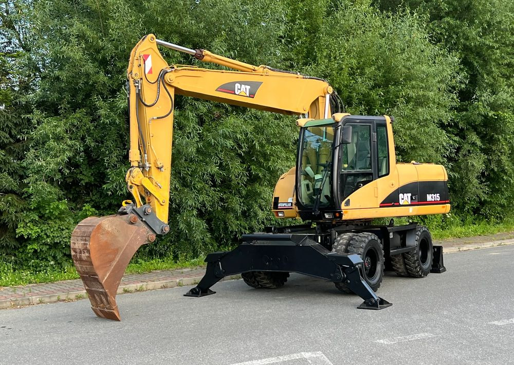 Caterpillar CAT M315C CATERPILLAR SPROWADZONY Bardzo Dobry Stan - Excavadora de ruedas: foto 1 Caterpillar CAT M315C CATERPILLAR SPROWADZONY Bardzo Dobry Stan - Excavadora de ruedas: foto 1