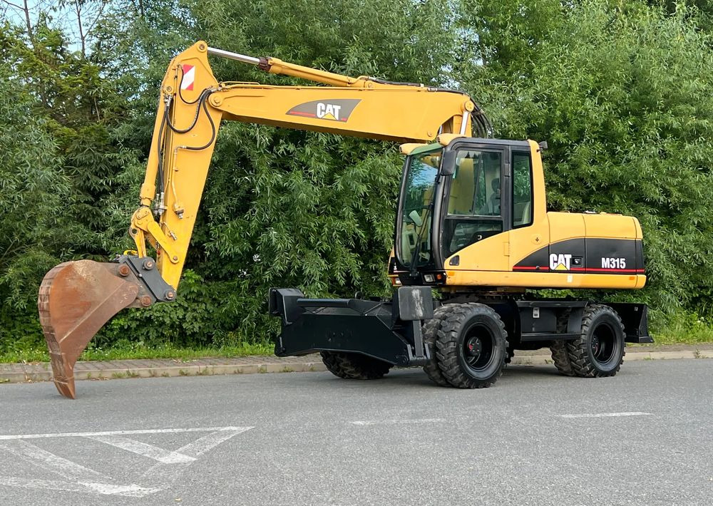 Excavadora de ruedas Caterpillar CAT M315C CATERPILLAR SPROWADZONY Bardzo Dobry Stan: foto 1