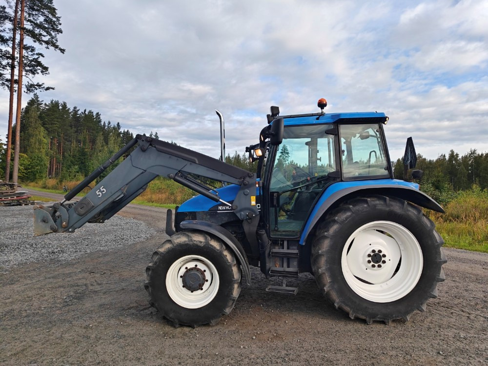 New Holland TS100, ES vaihteisto, ilmastointi, etukuormaaja Ålö Q55, katso video! - Tractor: foto 2 New Holland TS100, ES vaihteisto, ilmastointi, etukuormaaja Ålö Q55, katso video! - Tractor: foto 2