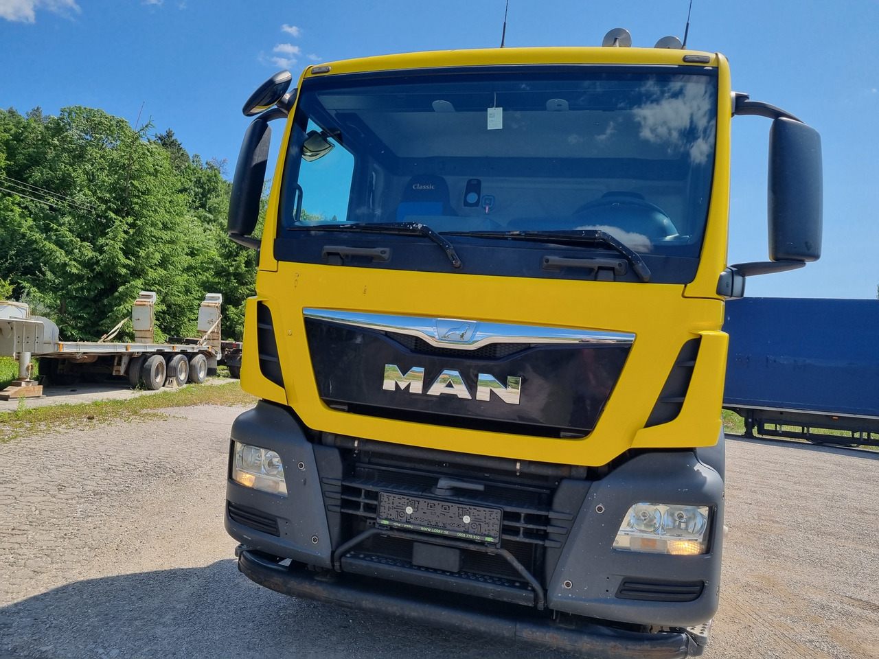MAN TGS 33.480 6x4 ABROLLKIPPER HIAB Multilift 18 T - Camión multibasculante: foto 2 MAN TGS 33.480 6x4 ABROLLKIPPER HIAB Multilift 18 T - Camión multibasculante: foto 2