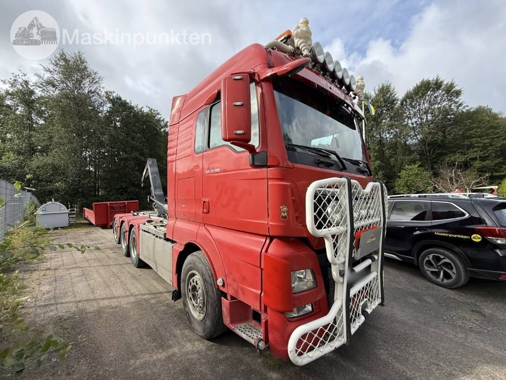 MAN TGX 35.500 EKIPAGE - Camión multibasculante: foto 1 MAN TGX 35.500 EKIPAGE - Camión multibasculante: foto 1
