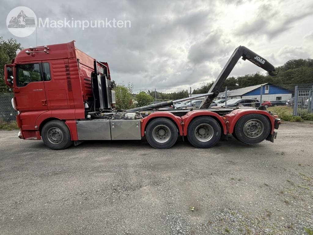 MAN TGX 35.500 EKIPAGE - Camión multibasculante: foto 1 MAN TGX 35.500 EKIPAGE - Camión multibasculante: foto 1