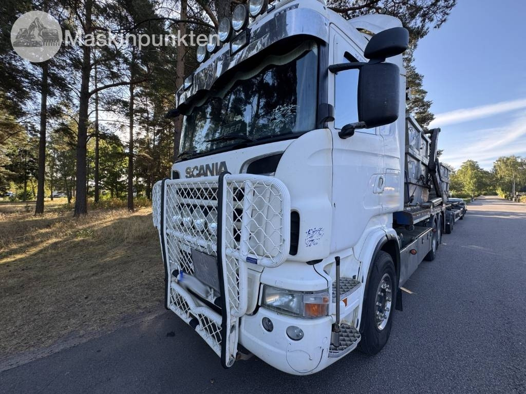 Scania R 560 LB - Camión portacontenedor de cadenas: foto 1 Scania R 560 LB - Camión portacontenedor de cadenas: foto 1