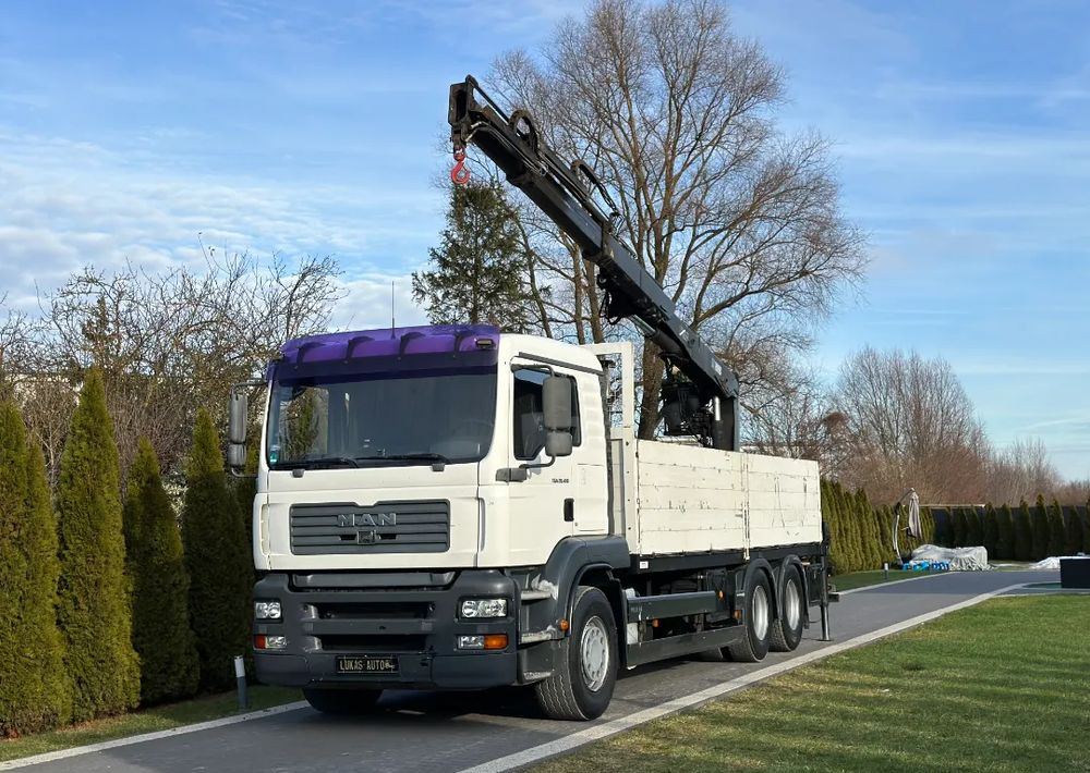 MAN TGA 24.410 6x4 HIAB MANUAL - Camión grúa, Camión caja abierta: foto 1 MAN TGA 24.410 6x4 HIAB MANUAL - Camión grúa, Camión caja abierta: foto 1