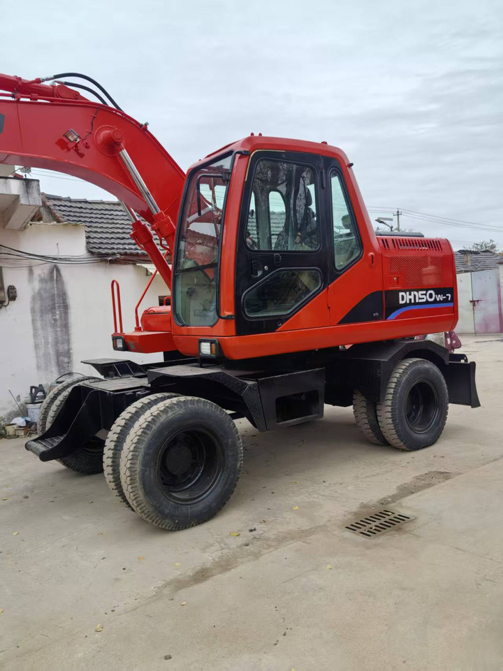 Doosan Used DH150W-7 wheeled excavator for sale at a low price. - Excavadora de ruedas: foto 1 Doosan Used DH150W-7 wheeled excavator for sale at a low price. - Excavadora de ruedas: foto 1