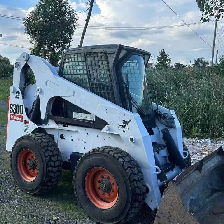 Used Bob Cat Bob Cat S300 Used Mini Skid Steer Wheel Loader Multifunctional Track Loaders Bobcat S300 - Minicargadora: foto 1 Used Bob Cat Bob Cat S300 Used Mini Skid Steer Wheel Loader Multifunctional Track Loaders Bobcat S300 - Minicargadora: foto 1