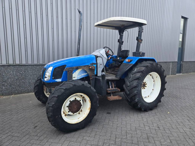 New Holland TL 90 A - Tractor: foto 1 New Holland TL 90 A - Tractor: foto 1