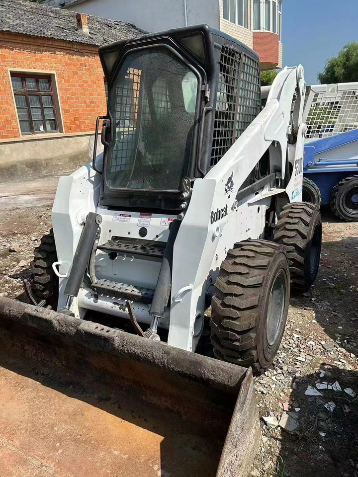 BOBCAT High Quality Mini Construction Machine Used Bobcat Skid Steer Loader S300 in Stock for Sale Bobcat Loader With Low Price - Maquinaria de construcción: foto 1 BOBCAT High Quality Mini Construction Machine Used Bobcat Skid Steer Loader S300 in Stock for Sale Bobcat Loader With Low Price - Maquinaria de construcción: foto 1