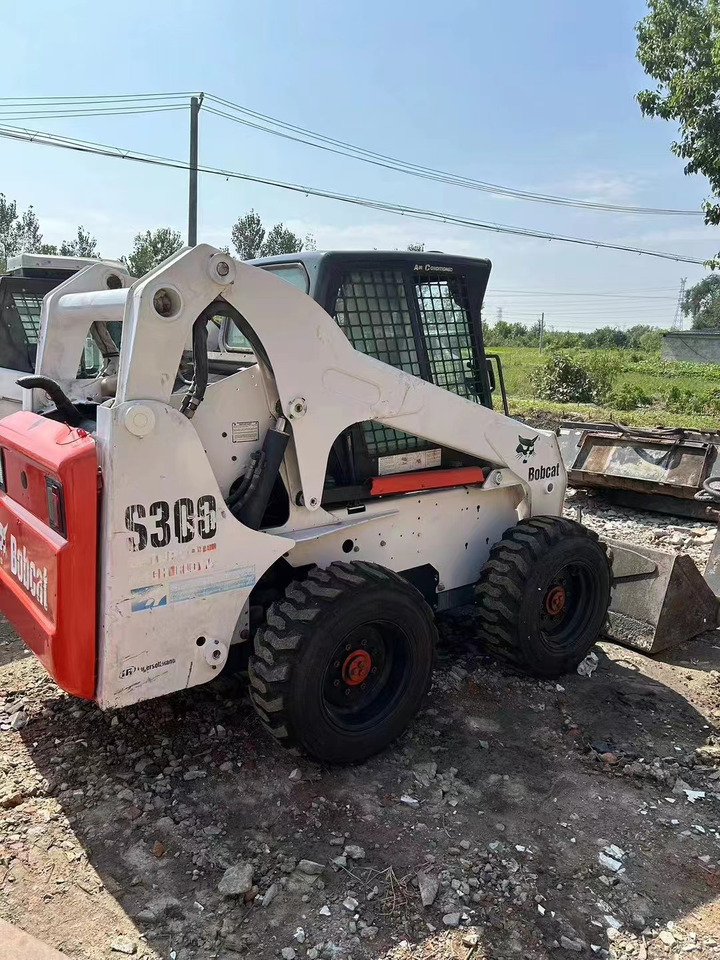 BOBCAT High Quality Mini Construction Machine Used Bobcat Skid Steer Loader S300 in Stock for Sale Bobcat Loader With Low Price - Maquinaria de construcción: foto 2 BOBCAT High Quality Mini Construction Machine Used Bobcat Skid Steer Loader S300 in Stock for Sale Bobcat Loader With Low Price - Maquinaria de construcción: foto 2