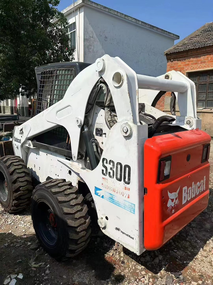 BOBCAT High Quality Mini Construction Machine Used Bobcat Skid Steer Loader S300 in Stock for Sale Bobcat Loader With Low Price - Maquinaria de construcción: foto 4 BOBCAT High Quality Mini Construction Machine Used Bobcat Skid Steer Loader S300 in Stock for Sale Bobcat Loader With Low Price - Maquinaria de construcción: foto 4