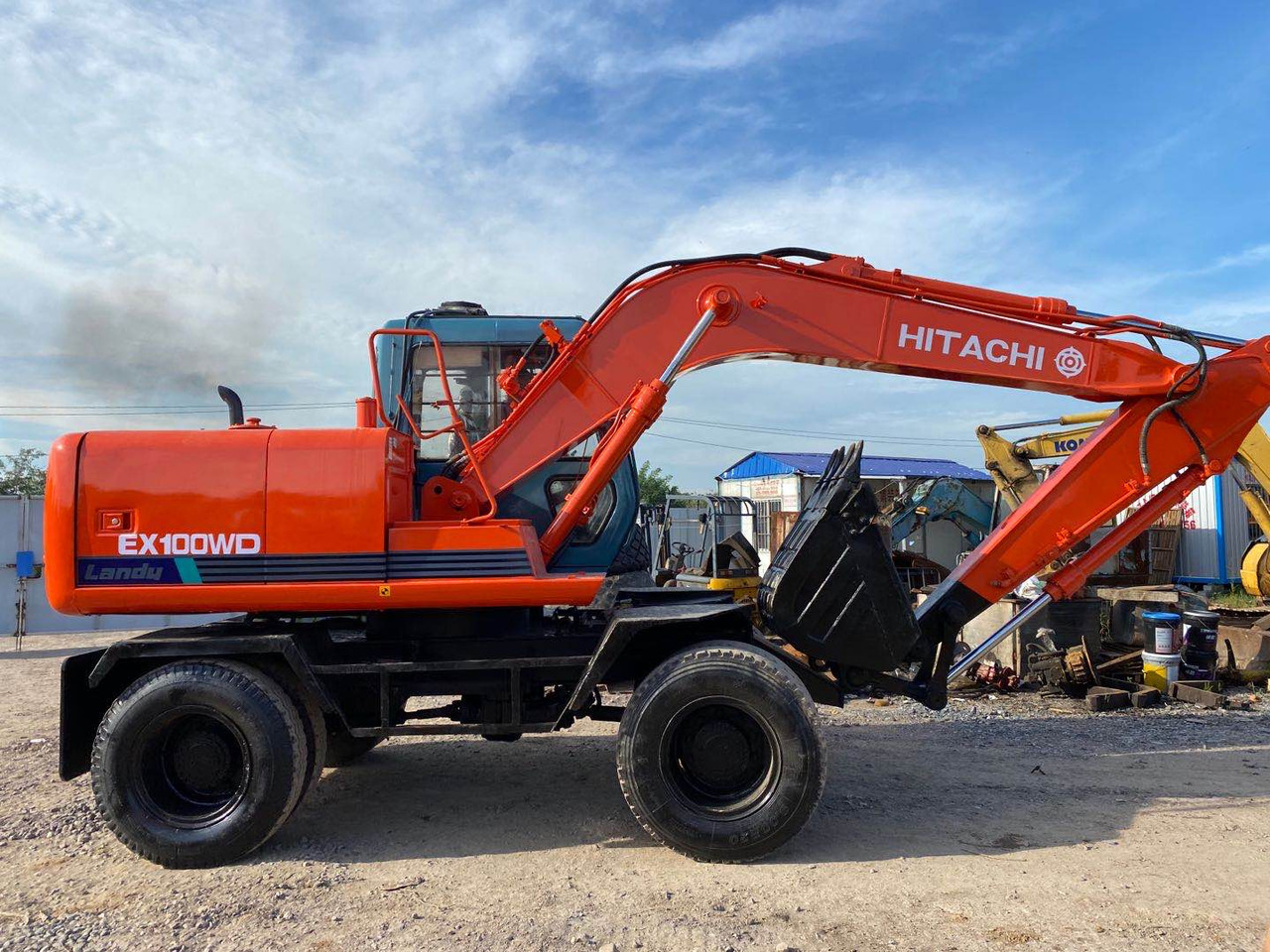 HITACHI EX100WD - Excavadora de ruedas: foto 1 HITACHI EX100WD - Excavadora de ruedas: foto 1