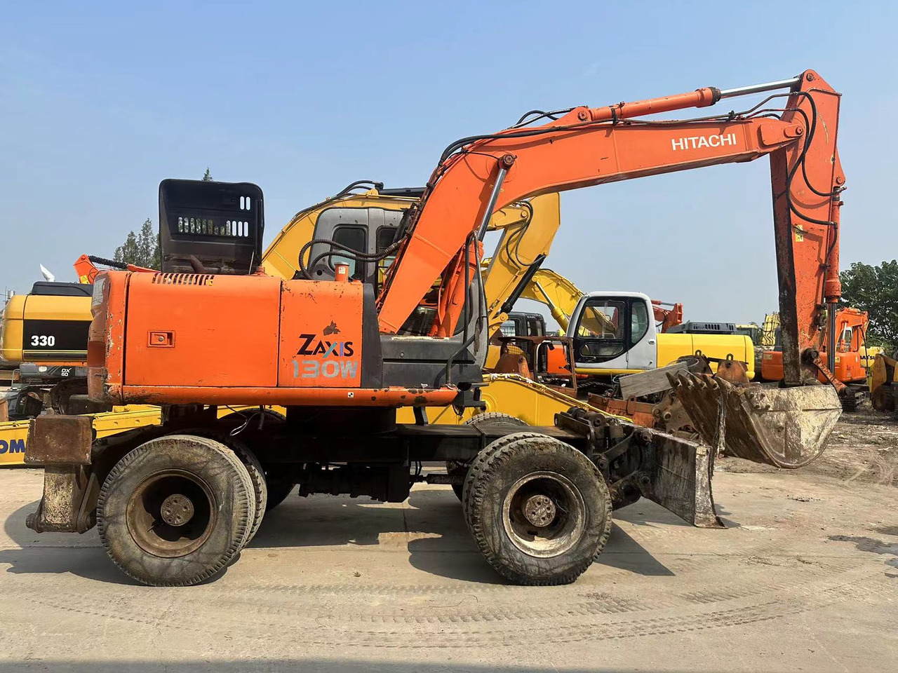HITACHI ZX130 - Excavadora de ruedas: foto 1 HITACHI ZX130 - Excavadora de ruedas: foto 1
