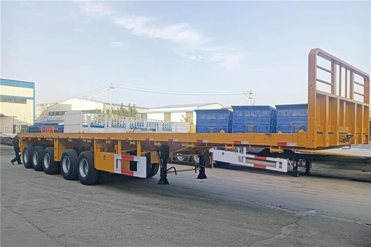 TITAN 4 Axle 13M Flatbed Trailer Price for Sale In Zimbabwe - Semirremolque plataforma/ Caja abierta: foto 1 TITAN 4 Axle 13M Flatbed Trailer Price for Sale In Zimbabwe - Semirremolque plataforma/ Caja abierta: foto 1