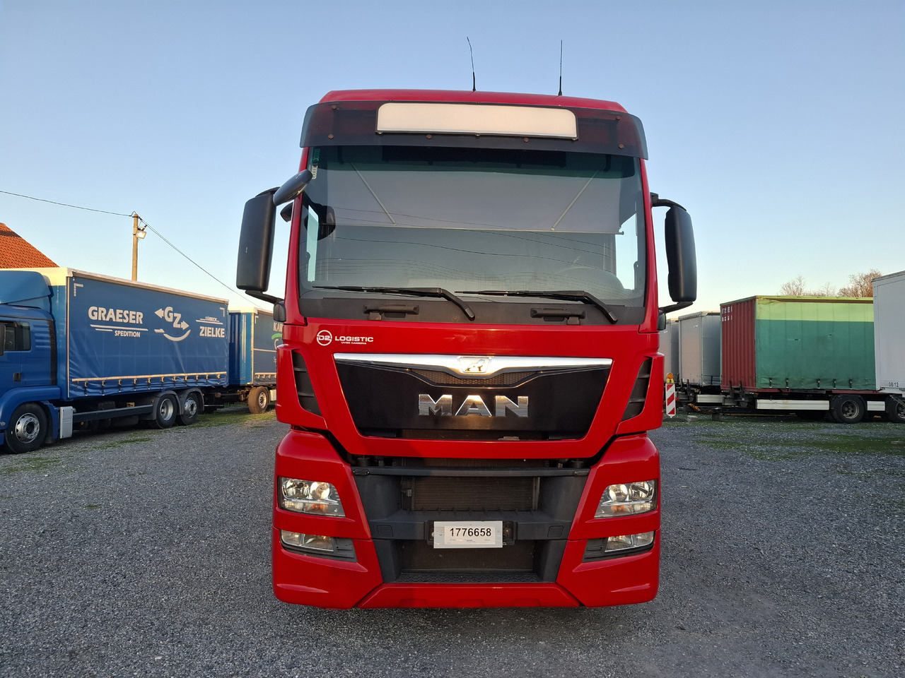 MAN TGX 26.440 E6 + SCHMITZ - Camión lona: foto 2 MAN TGX 26.440 E6 + SCHMITZ - Camión lona: foto 2