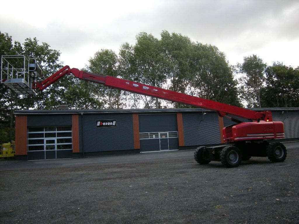 Genie Arbeitsbühne Genie S-85, AH 28 m - Camión con plataforma elevadora: foto 1 Genie Arbeitsbühne Genie S-85, AH 28 m - Camión con plataforma elevadora: foto 1
