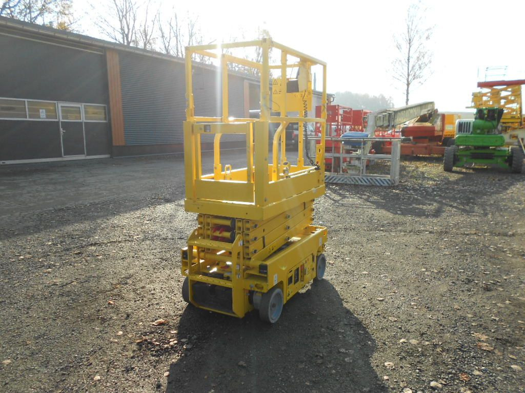 Camión con plataforma elevadora Genie GS 1330, Scherenarbeitsbühne Genie 5,9 m: foto 14 Camión con plataforma elevadora Genie GS 1330, Scherenarbeitsbühne Genie 5,9 m: foto 14