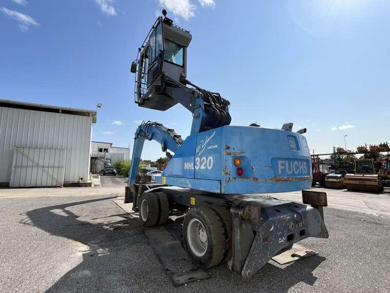 Fuchs MHL 320 - Manipulador de materiales: foto 3 Fuchs MHL 320 - Manipulador de materiales: foto 3