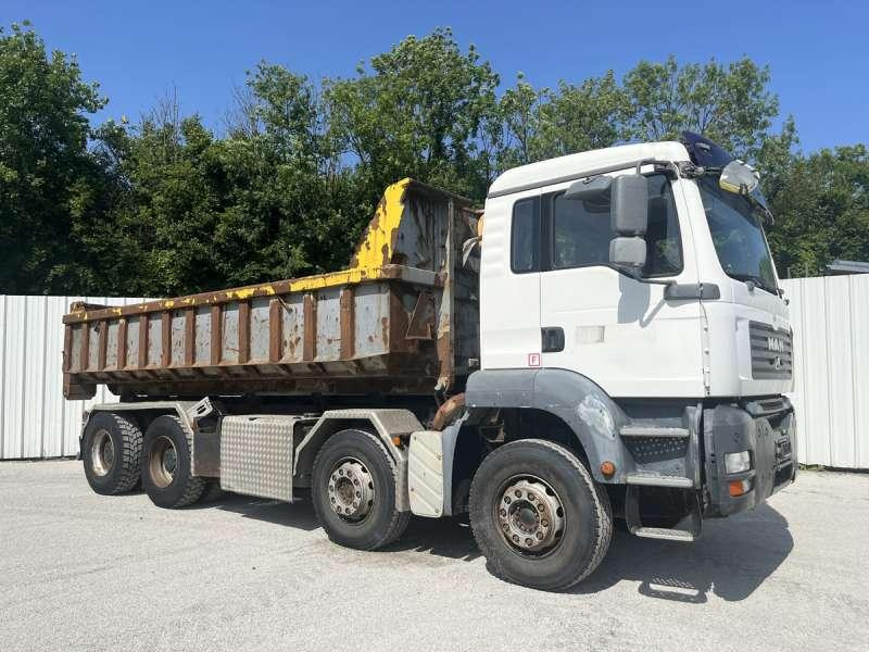 MAN TGA 35.440 8X4 - Camión multibasculante: foto 1 MAN TGA 35.440 8X4 - Camión multibasculante: foto 1