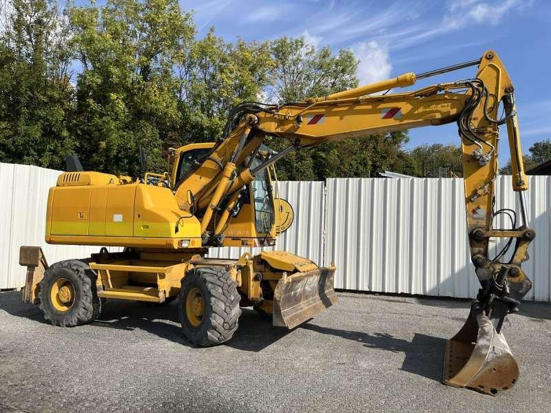 Volvo Pelle sur Pneus EW140D - Excavadora de ruedas: foto 1 Volvo Pelle sur Pneus EW140D - Excavadora de ruedas: foto 1