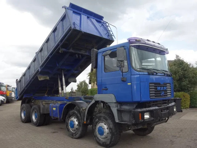 MAN 35.414 8x8 meiller kipper manual diesel pomp - Camión volquete: foto 1 MAN 35.414 8x8 meiller kipper manual diesel pomp - Camión volquete: foto 1
