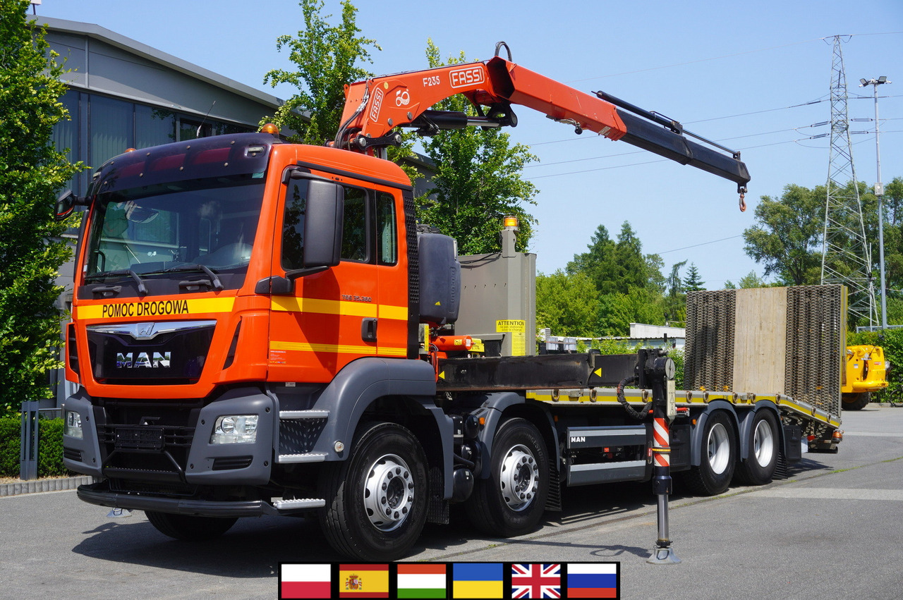 MAN TGS 35.360 E6 8x2 / FASSI F235 crane / 6.5 T cap. / 8.3 m reach - Camión portavehículos, Camión grúa: foto 1 MAN TGS 35.360 E6 8x2 / FASSI F235 crane / 6.5 T cap. / 8.3 m reach - Camión portavehículos, Camión grúa: foto 1