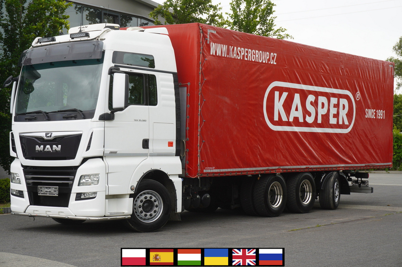 MAN TGX 35.580 E6 8x4 /4 / 23 EPAL tarp superstructure / 4th axle steered - Camión lona: foto 1 MAN TGX 35.580 E6 8x4 /4 / 23 EPAL tarp superstructure / 4th axle steered - Camión lona: foto 1