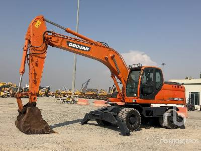 DOOSAN DX210W - Excavadora de ruedas: foto 1 DOOSAN DX210W - Excavadora de ruedas: foto 1