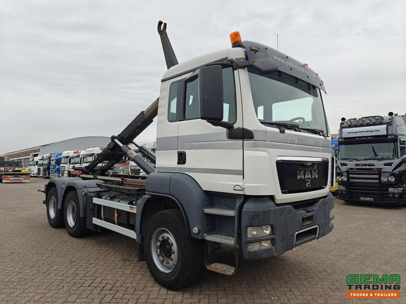 MAN TGS-TGX 26.440 6x4 Dagcabine Euro5 - AJK 20T HaakarmSysteem - Volledig Bladgeveerd - Naafreductie - Handgeschakeld - Camión multibasculante: foto 4 MAN TGS-TGX 26.440 6x4 Dagcabine Euro5 - AJK 20T HaakarmSysteem - Volledig Bladgeveerd - Naafreductie - Handgeschakeld - Camión multibasculante: foto 4
