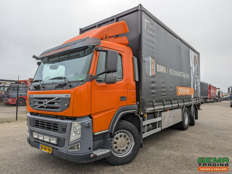 Volvo FM330 6x2/4 Daycab Euro5 EEV - SchuifzeilenBak 6.7m. - KooiAap Aansluiting - HH Vloer - Rongen - Camión lona: foto 1 Volvo FM330 6x2/4 Daycab Euro5 EEV - SchuifzeilenBak 6.7m. - KooiAap Aansluiting - HH Vloer - Rongen - Camión lona: foto 1