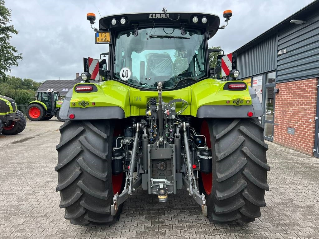 Claas Arion 660 - Tractor: foto 4 Claas Arion 660 - Tractor: foto 4