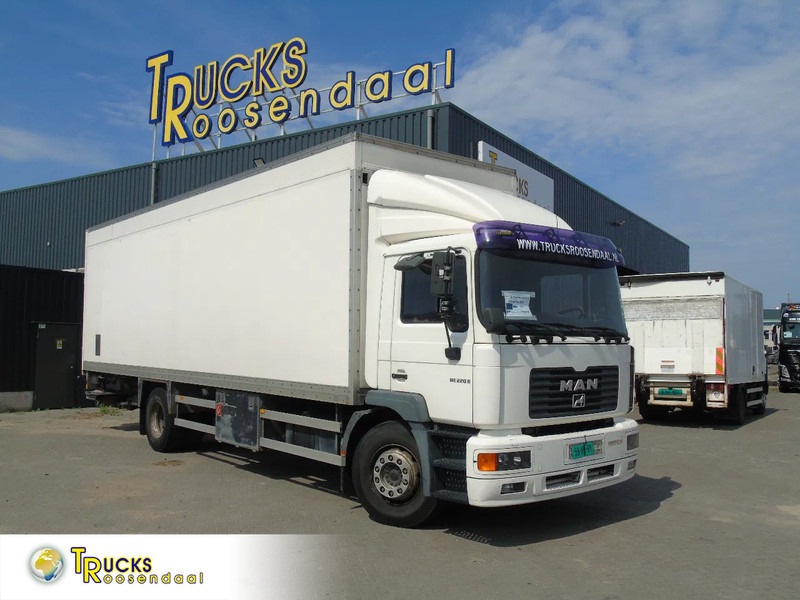 MAN L 220 + MANUAL + EURO 2 + DHOLLANDIA + 19T - Camión caja cerrada: foto 1 MAN L 220 + MANUAL + EURO 2 + DHOLLANDIA + 19T - Camión caja cerrada: foto 1