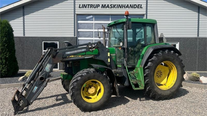 John Deere 6510 Med frontlæsser - Tractor: foto 1 John Deere 6510 Med frontlæsser - Tractor: foto 1