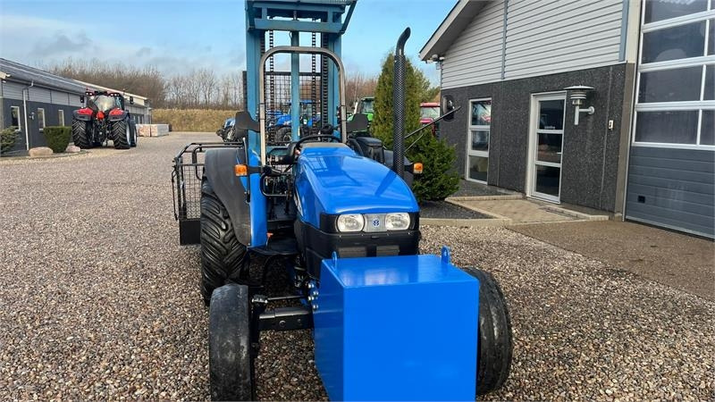 Tractor New Holland TN55D Med Byggelift: foto 17 Tractor New Holland TN55D Med Byggelift: foto 17