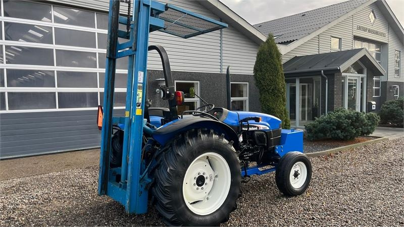 Tractor New Holland TN55D Med Byggelift: foto 13 Tractor New Holland TN55D Med Byggelift: foto 13