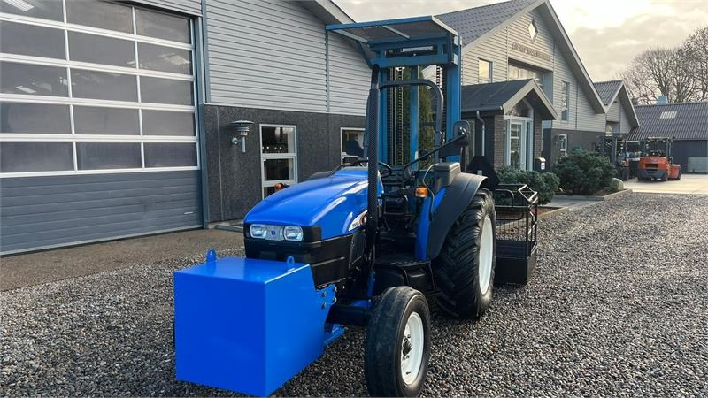 Tractor New Holland TN55D Med Byggelift: foto 8 Tractor New Holland TN55D Med Byggelift: foto 8