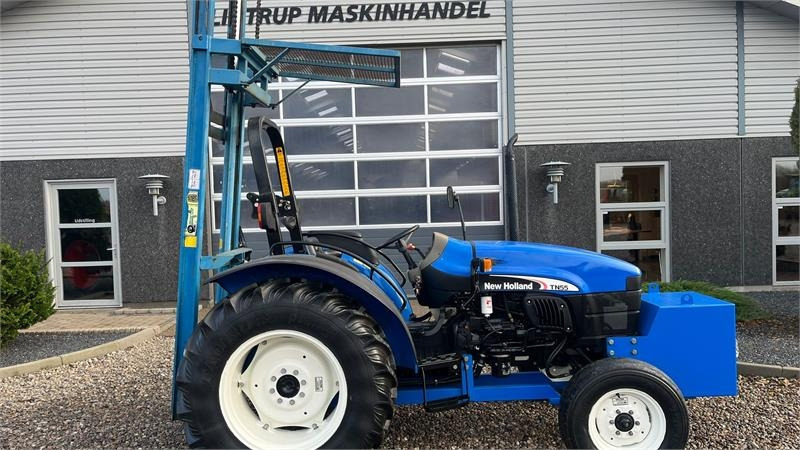 Tractor New Holland TN55D Med Byggelift: foto 12 Tractor New Holland TN55D Med Byggelift: foto 12