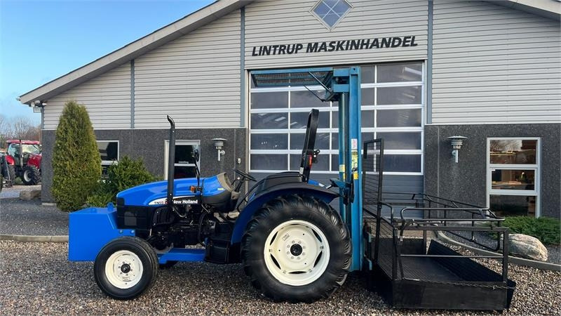 Tractor New Holland TN55D Med Byggelift: foto 10 Tractor New Holland TN55D Med Byggelift: foto 10