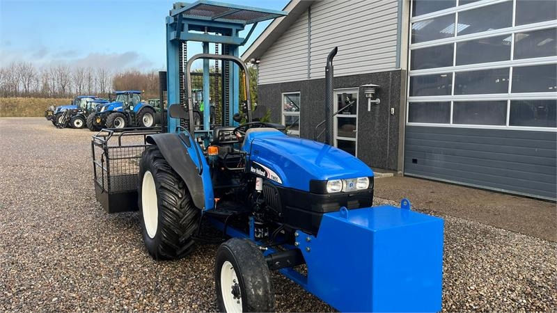 Tractor New Holland TN55D Med Byggelift: foto 16 Tractor New Holland TN55D Med Byggelift: foto 16