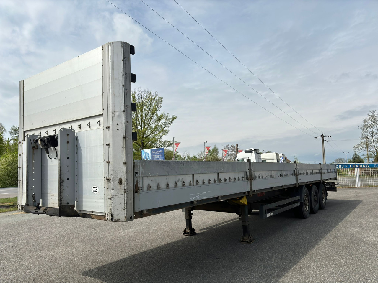 KÖGEL SN 24 - Semirremolque plataforma/ Caja abierta: foto 1 KÖGEL SN 24 - Semirremolque plataforma/ Caja abierta: foto 1