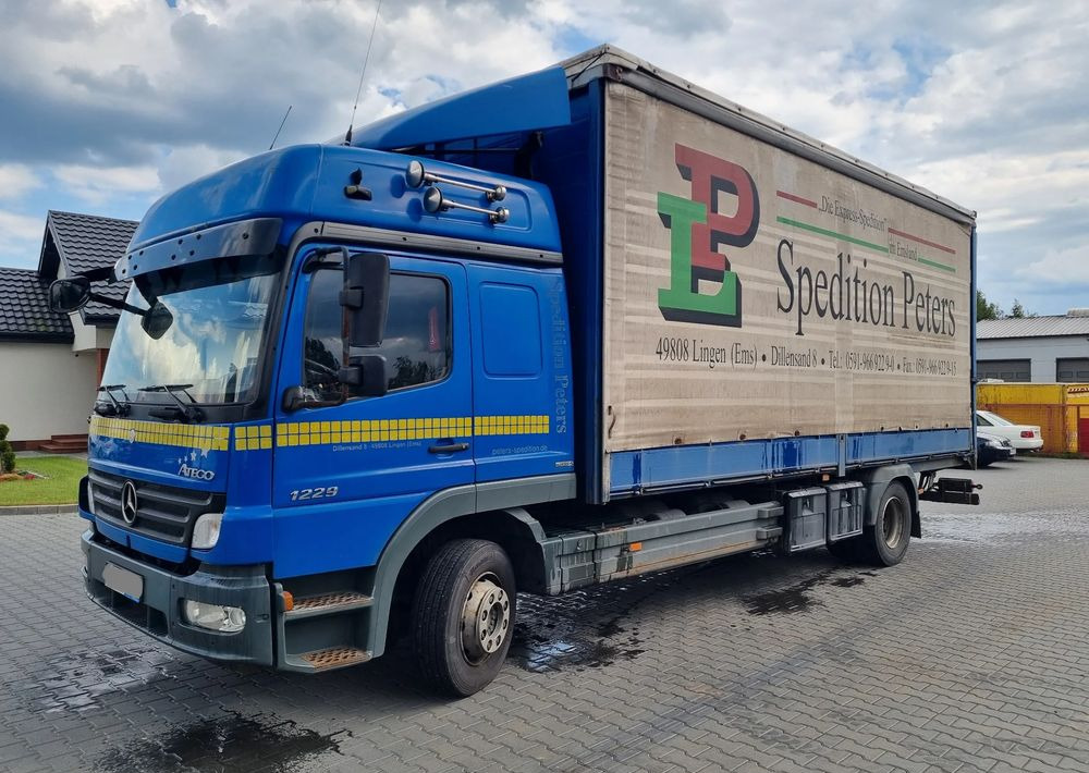 Mercedes-Benz Atego 1229 - Grua de remolque autos: foto 1 Mercedes-Benz Atego 1229 - Grua de remolque autos: foto 1