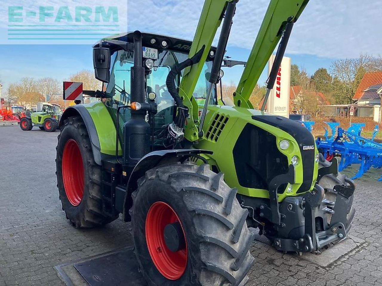 CLAAS arion 650 cis + fl140 + maxi-care - Tractor: foto 4 CLAAS arion 650 cis + fl140 + maxi-care - Tractor: foto 4