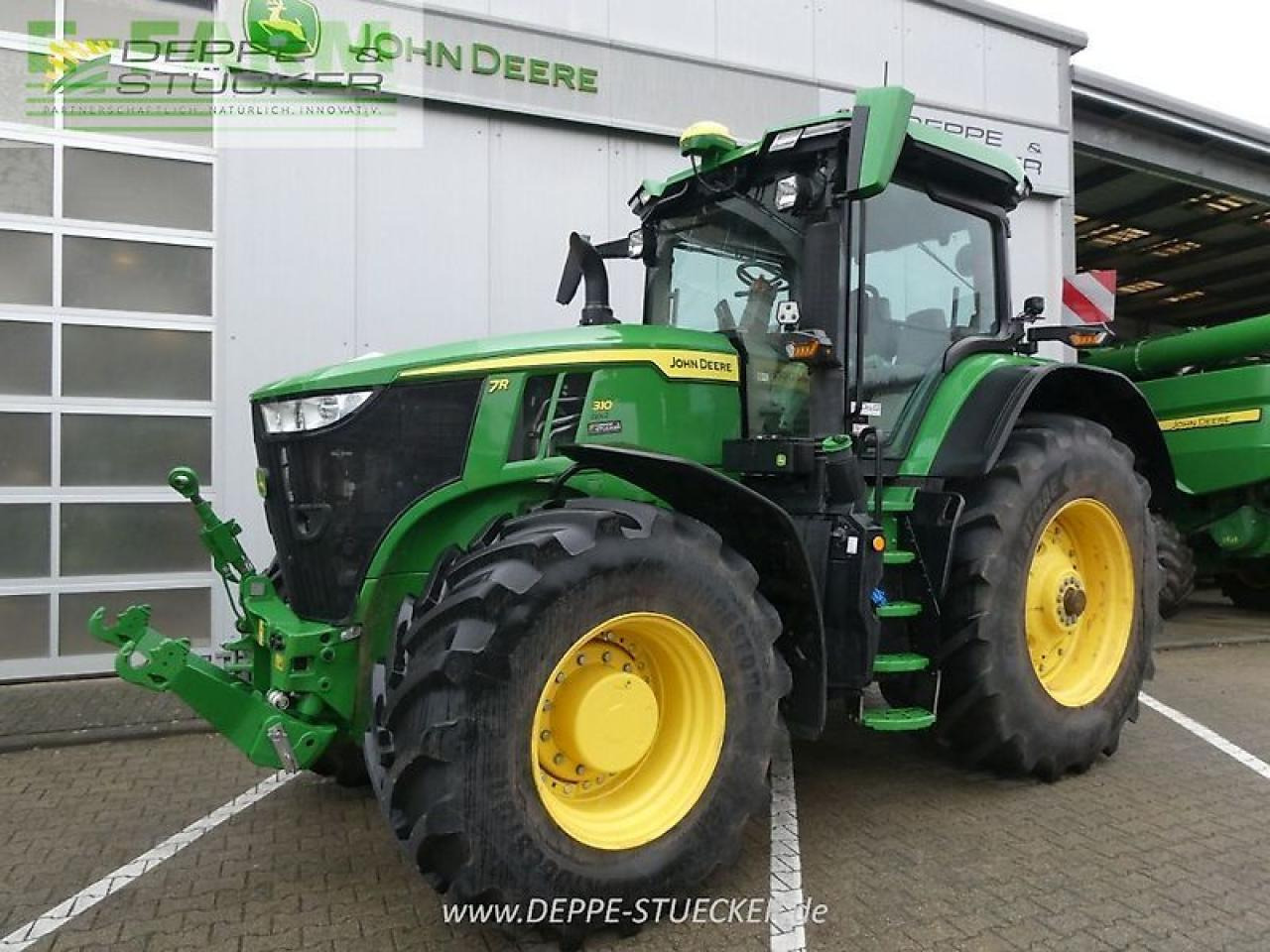 John Deere 7r 310 - Tractor: foto 1 John Deere 7r 310 - Tractor: foto 1